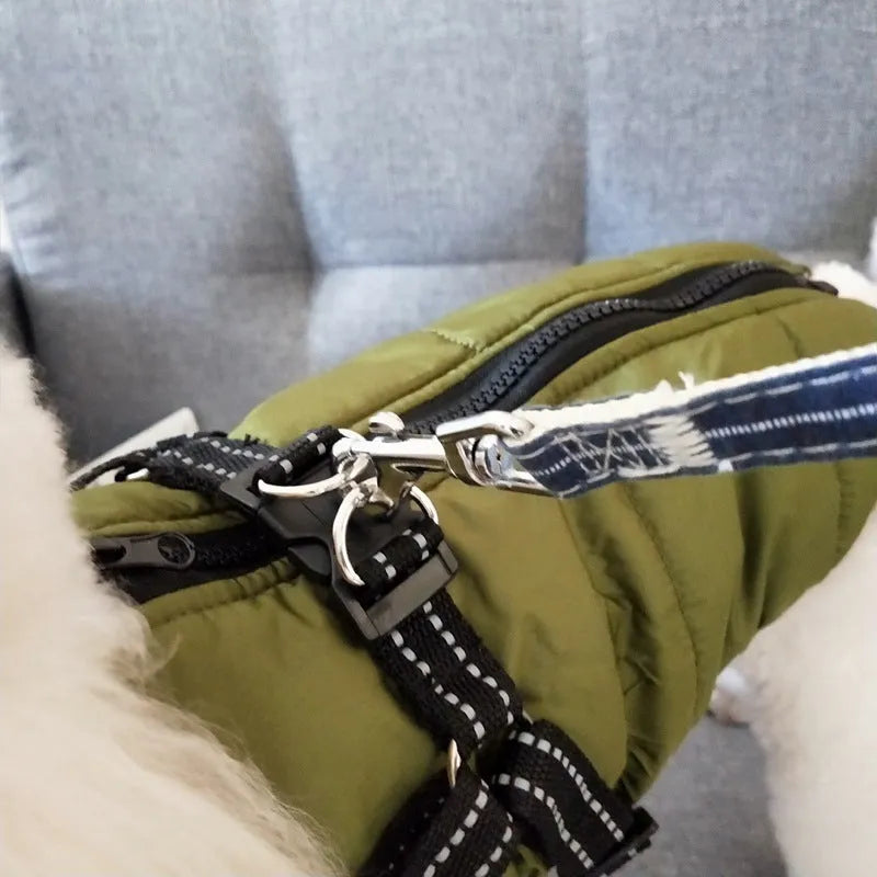 Red waterproof dog coat for large breeds with visible opening for a harness on the back.