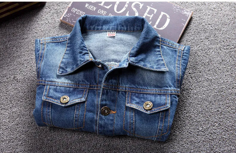 Children's dark blue cotton ripped denim jacket with hood, front view, single breasted style