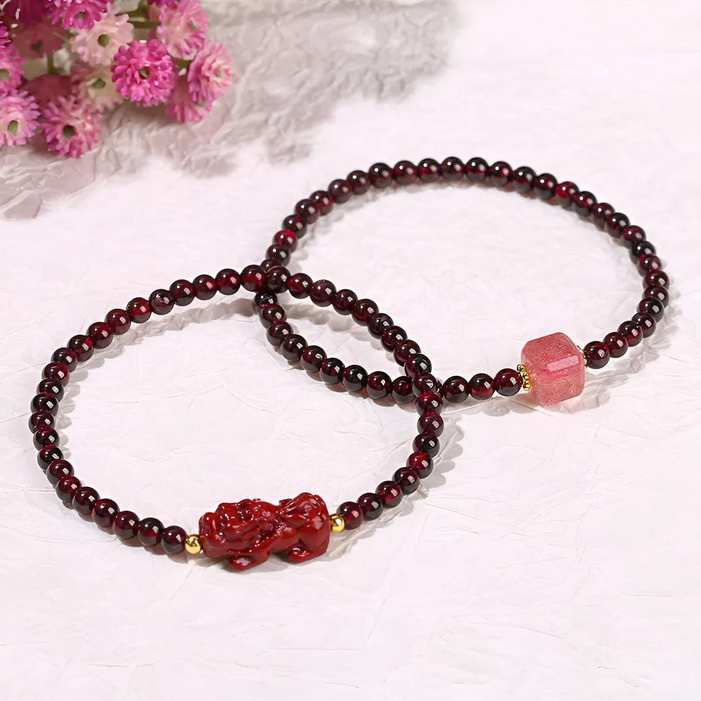 Natural garnet square bracelet with a carved purple sand and strawberry quartz Pixiu charm.