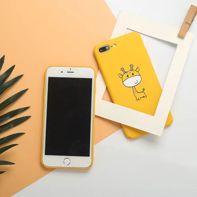Yellow polycarbonate phone case with a printed pattern, shown fitted on an iPhone.