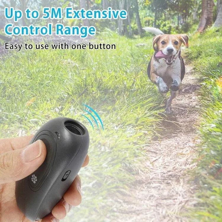 Handheld ultrasonic dog repeller in black with frequency button, ABS plastic, 9.5 cm height