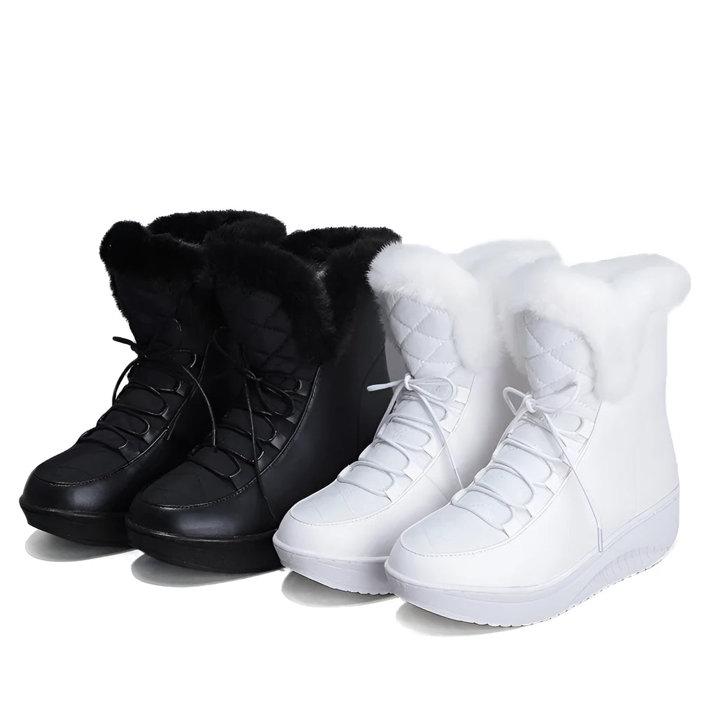 Black lace-up women's winter boots with a platform heel and plush lining on a white background.