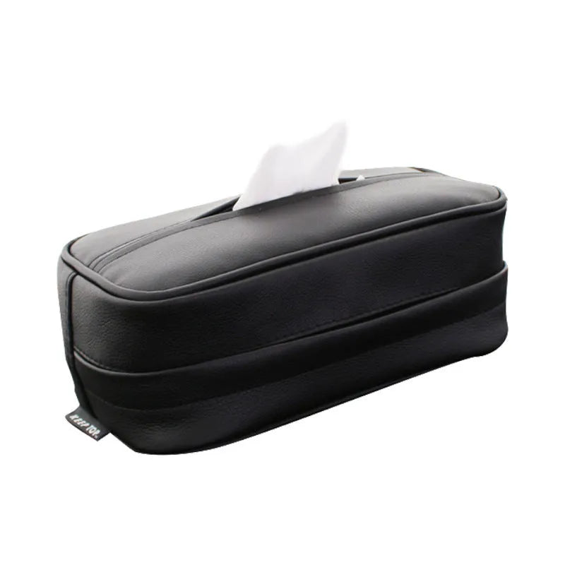 Black leather hanging storage box with strap handles for car and home organisation