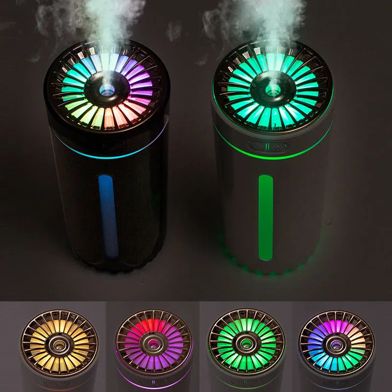 Black USB car humidifier with LED lights placed in vehicle cup holder showing mist output