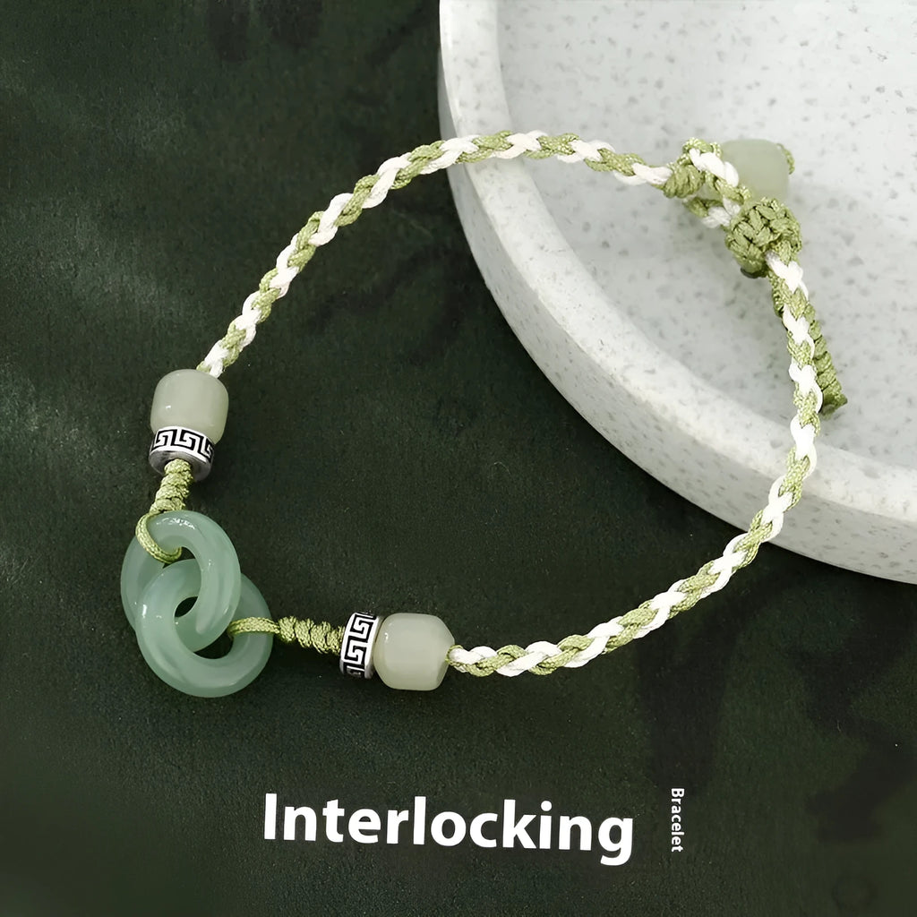 Women's green and copper ethnic-style bracelet with jade buckle weaving and a peace buckle charm.