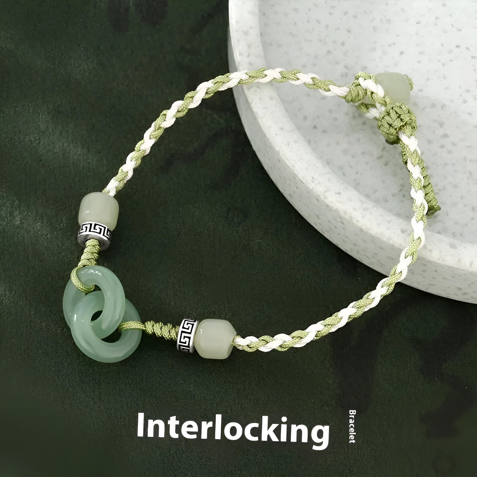 Women's green and copper ethnic-style bracelet with jade buckle weaving and a peace buckle charm.