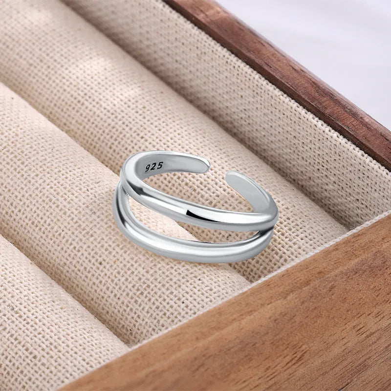 Women's retro copper double layer hollow geometry ring with adjustable opening.