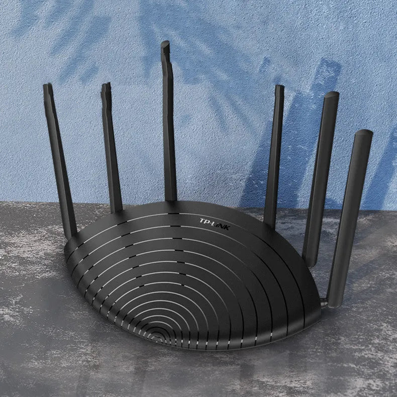 TL-WDR7661 AC1900 Gigabit wireless home router with antenna showing front panel and ports.