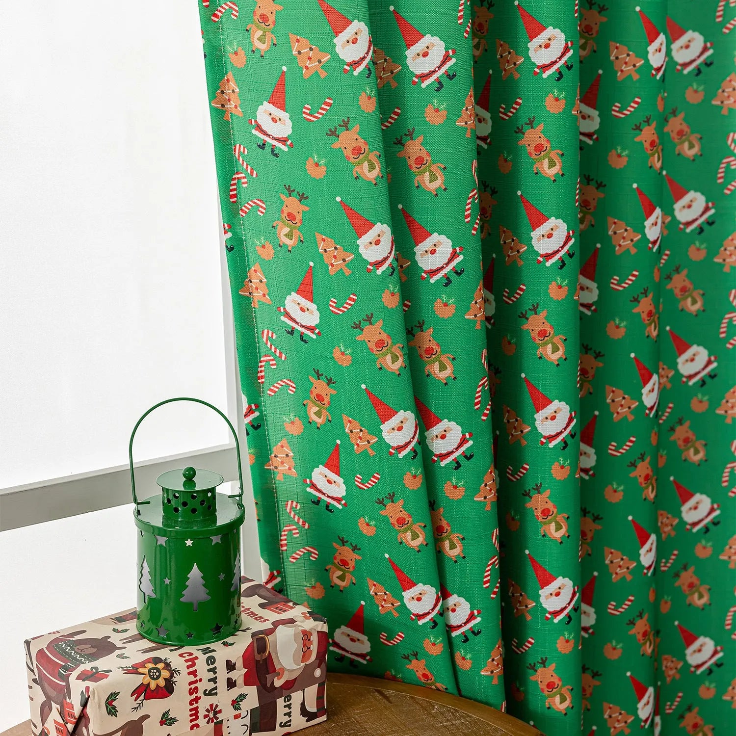Christmas curtain with snowman and angel print in green colour, 1 metre wide panel