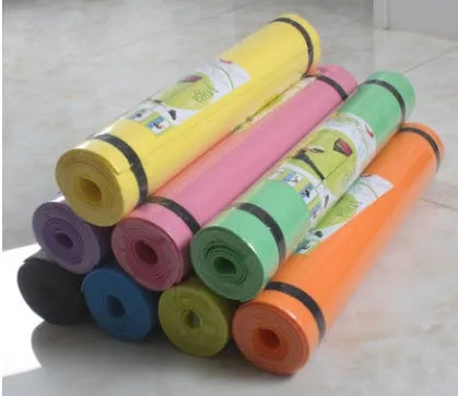 EVA fitness yoga mat in blue, showing non-slip texture and 4mm thickness.