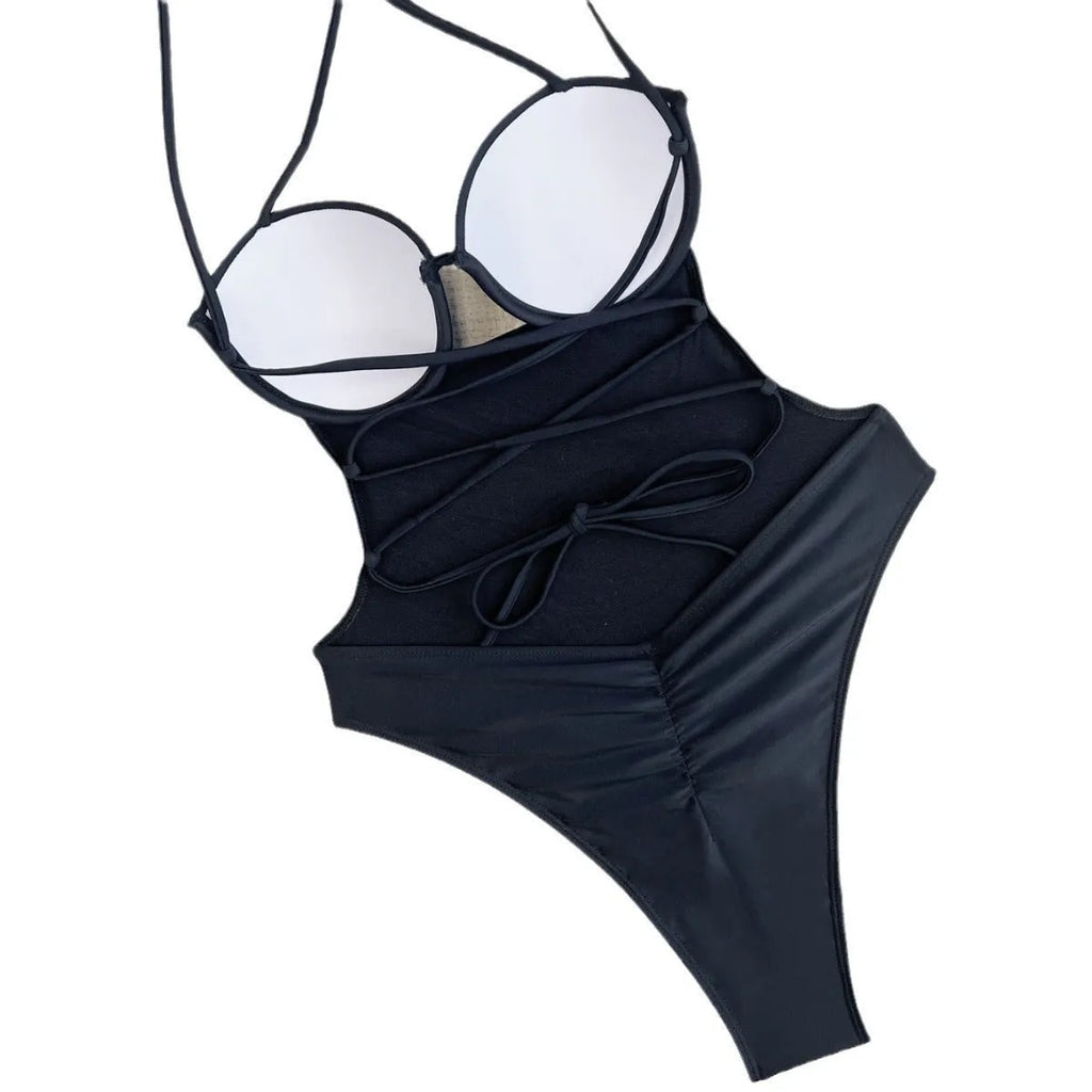 Solid black one-piece swimsuit for women on hanger showing front design