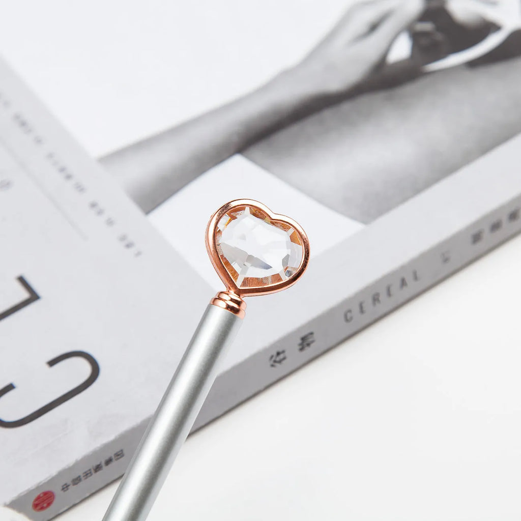 Creative Crystal Love Ball Diamond Metal Pen in golden, rose gold, and silver finishes showing decorative pattern