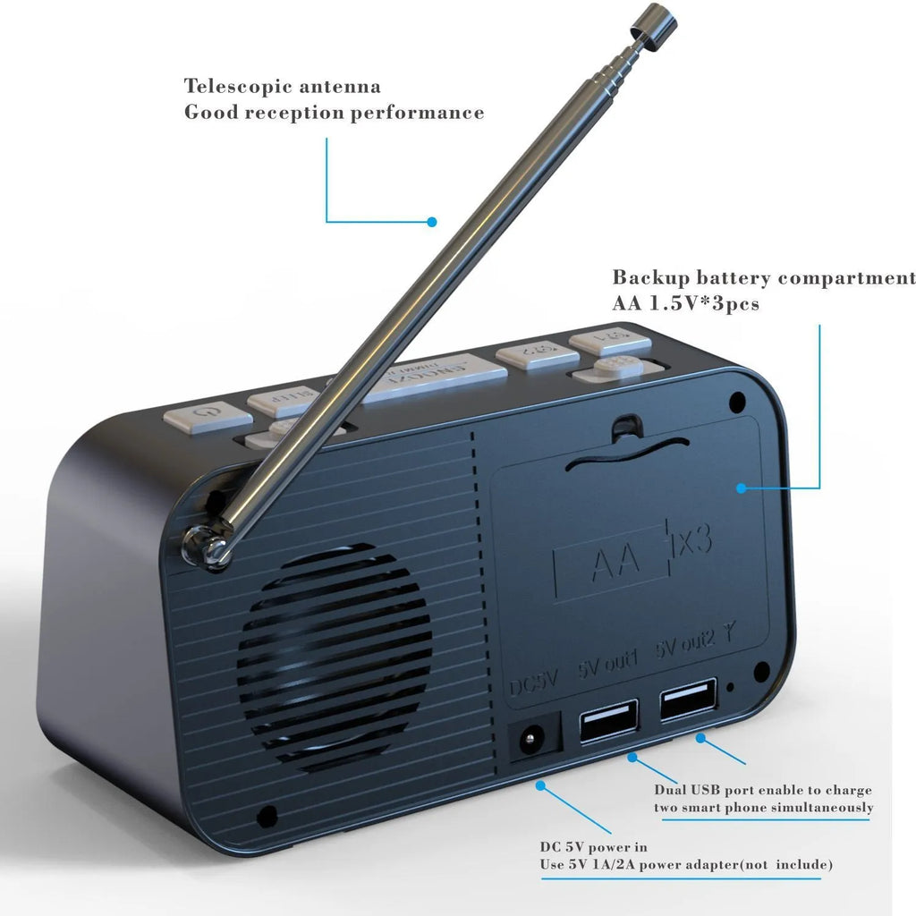Black DAB bedside alarm clock with large LED display, pig tail antenna, and USB ports on a wooden table.