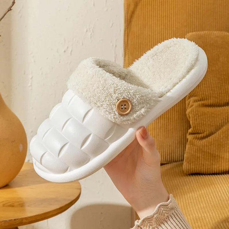 Plaid detachable EVA slippers with plush lining in pink, shown on a foot.