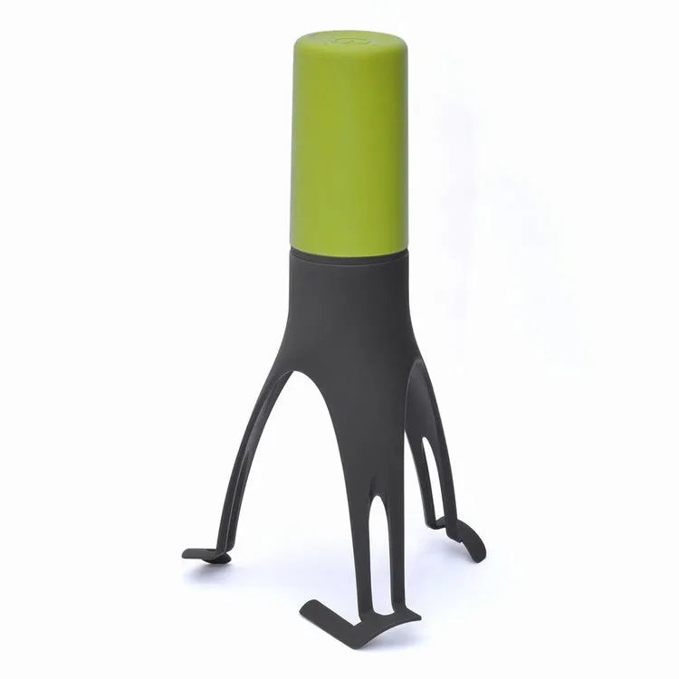 Uutensil Stirr automatic cooking mixer device in green colour showing 22 cm portable design for pot stirring