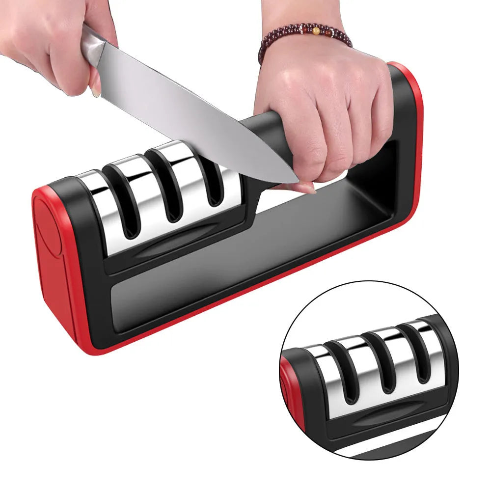 Black and red professional three-stage diamond knife sharpener on a kitchen countertop
