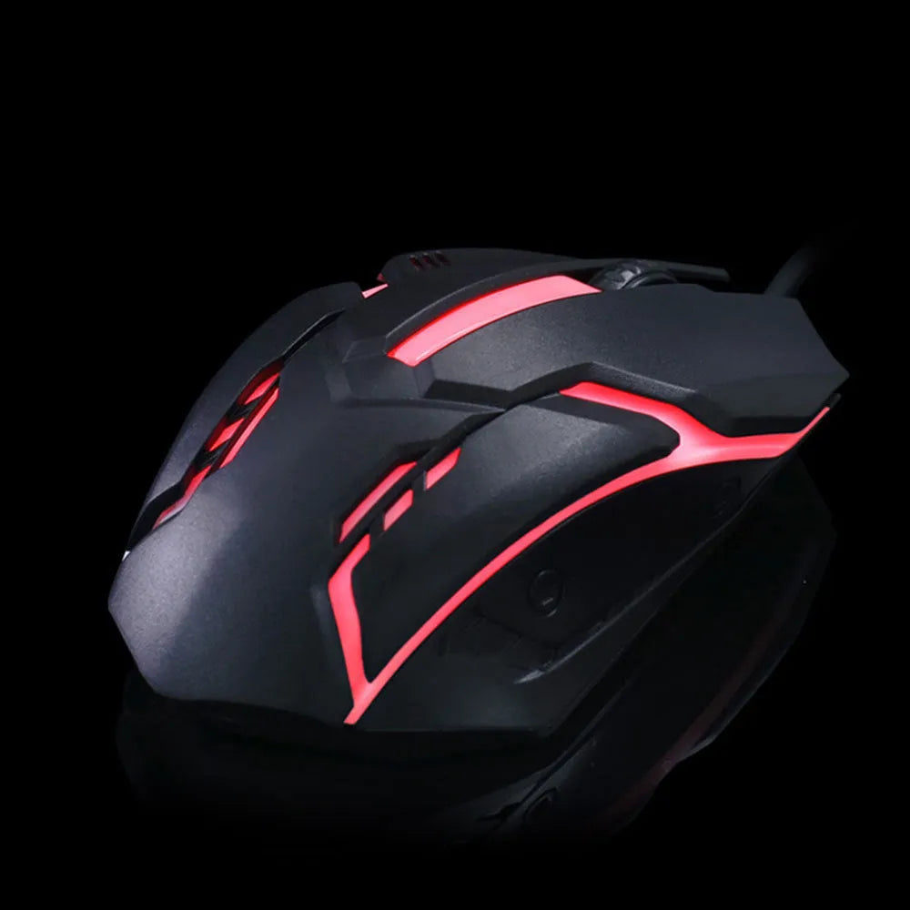 Black and white luminous wired optical mouse with USB cable on a desk