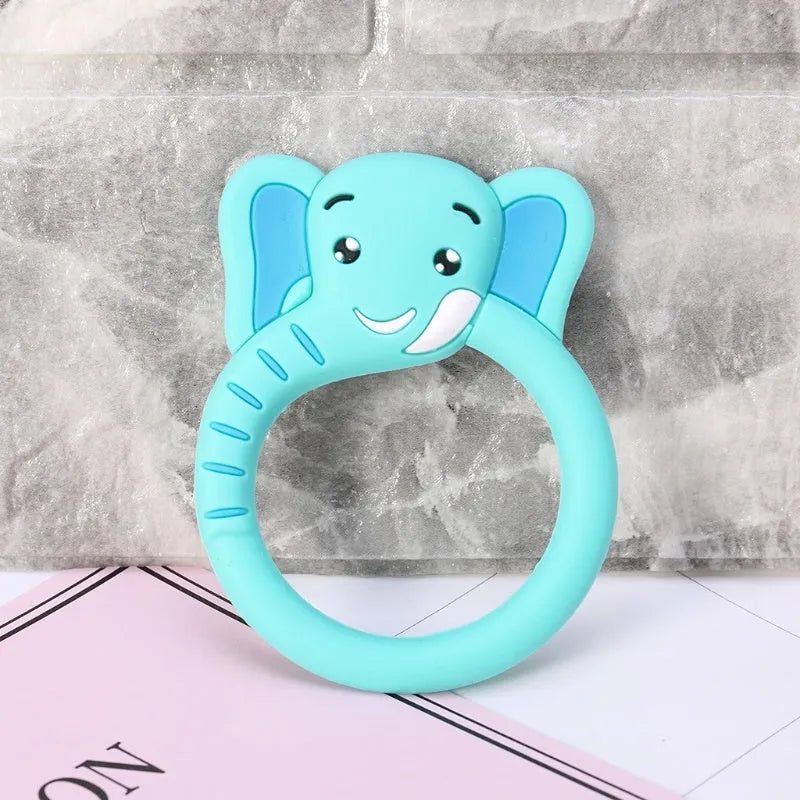 Three baby molar silicone teethers in brown, blue, and yellow on a white background