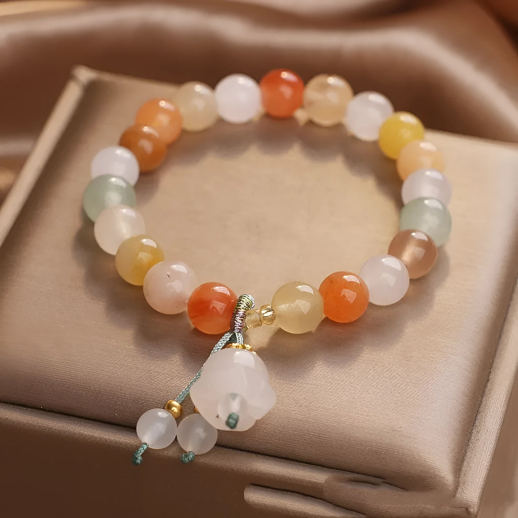 Natural Jinsi Jade beaded bracelet for women with round beads and lily pendant in jade colour