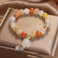 Natural Jinsi Jade beaded bracelet for women with round beads and lily pendant in jade colour