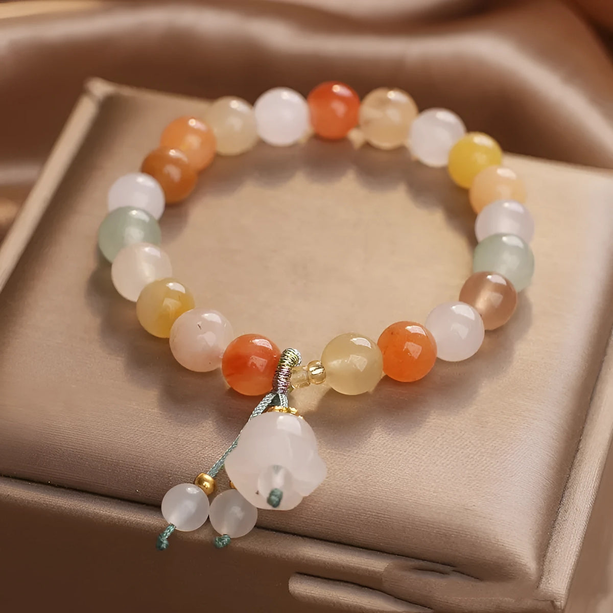 Natural Jinsi Jade beaded bracelet for women with round beads and lily pendant in jade colour