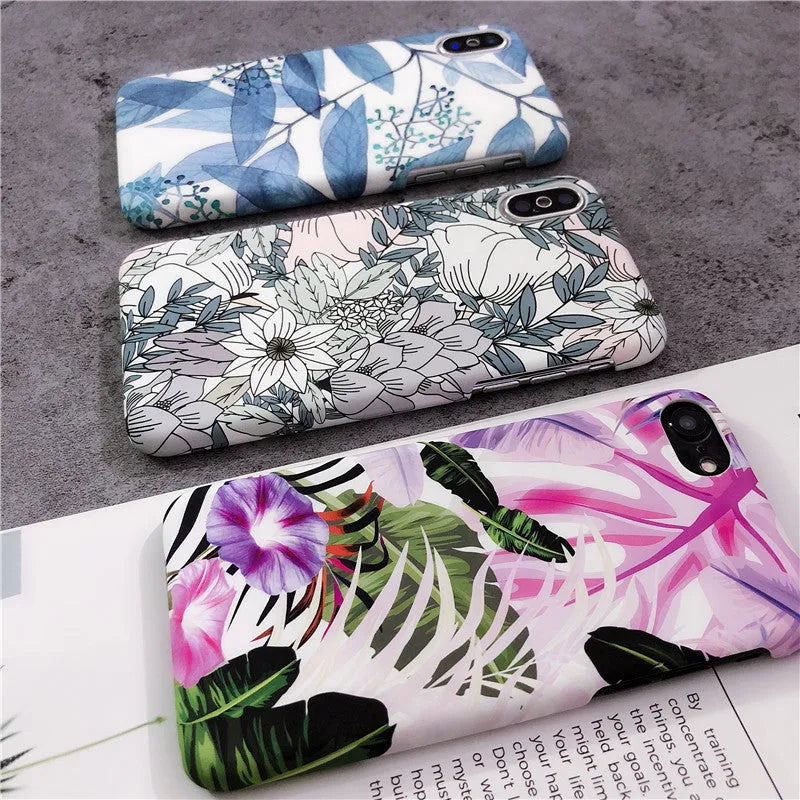 White leaf and morning glory flower oil painting design on an iPhone protective case.