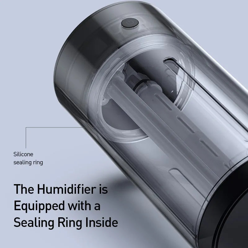 Black aluminium alloy car humidifier and air purifier with USB cable on a desk