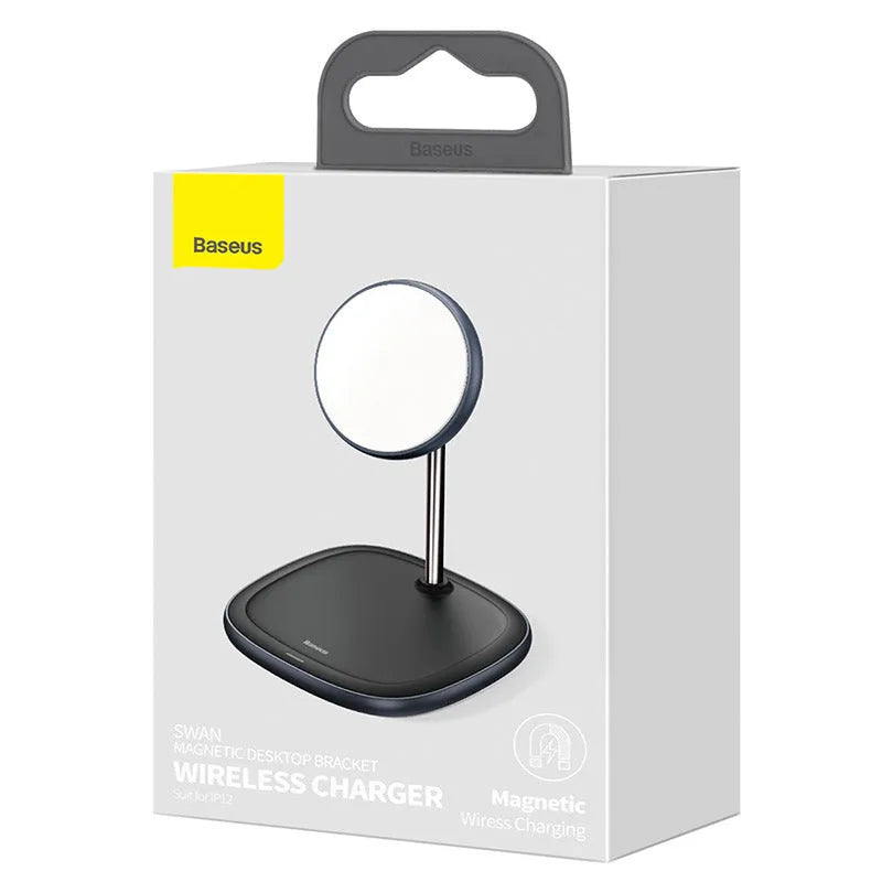 Black magnetic wireless charging stand holding an iPhone 12 upright on a desk.