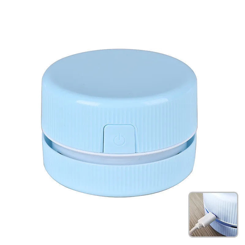 Pink and blue mini handheld desktop vacuum cleaner for pencil shavings and fine debris