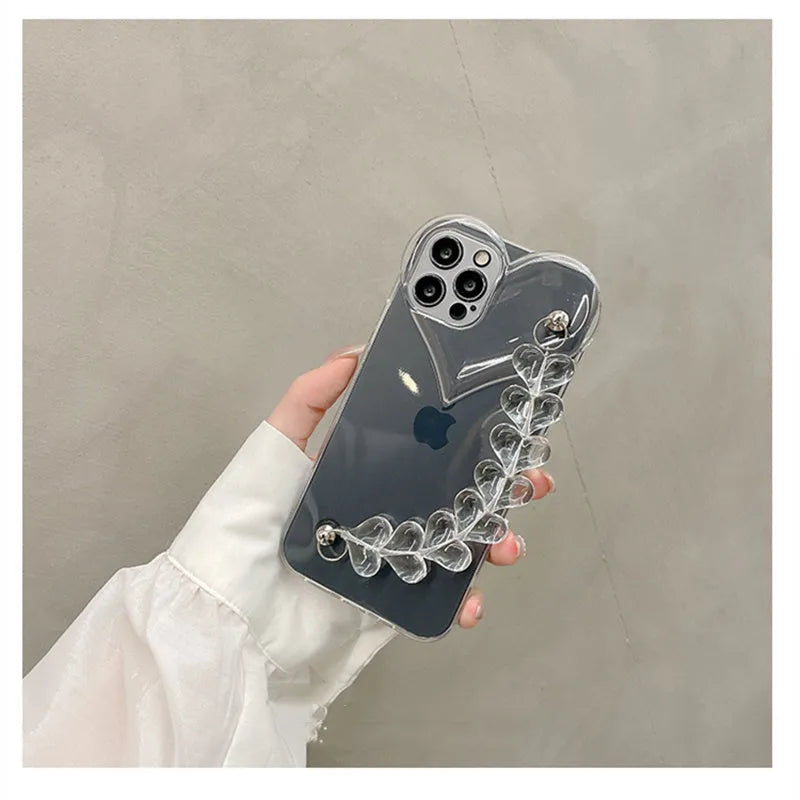 Transparent iPhone case with a love heart and bracelet chain design on a soft TPU background.
