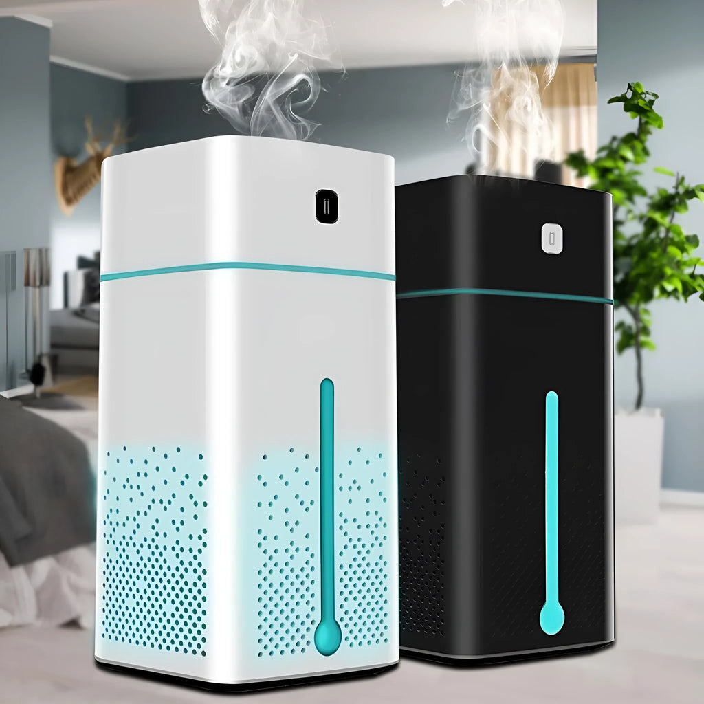 Black and white USB desktop humidifier with 1000ml water tank on a desk.