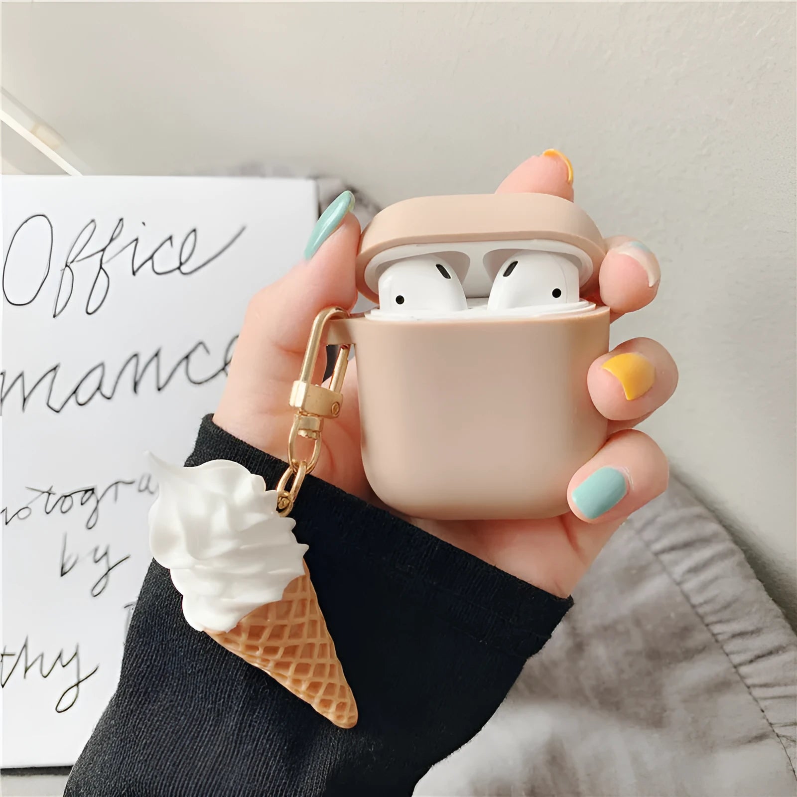 Silicone protector case for Apple AirPods 2 in a cylinder ice cream design.