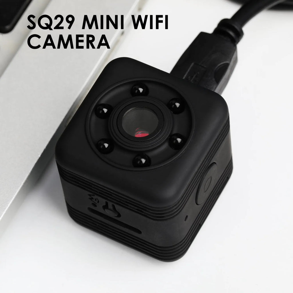 Black SQ29 waterproof sports camera with MicroUSB port and TF card slot.