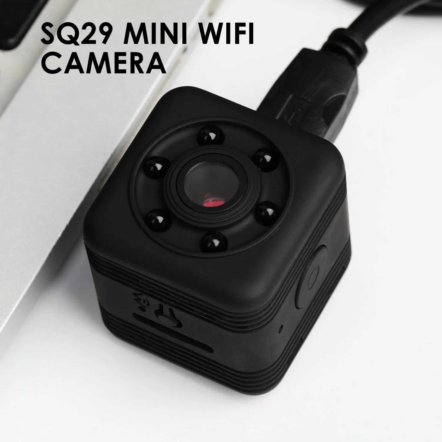 Black SQ29 waterproof sports camera with MicroUSB port and TF card slot.