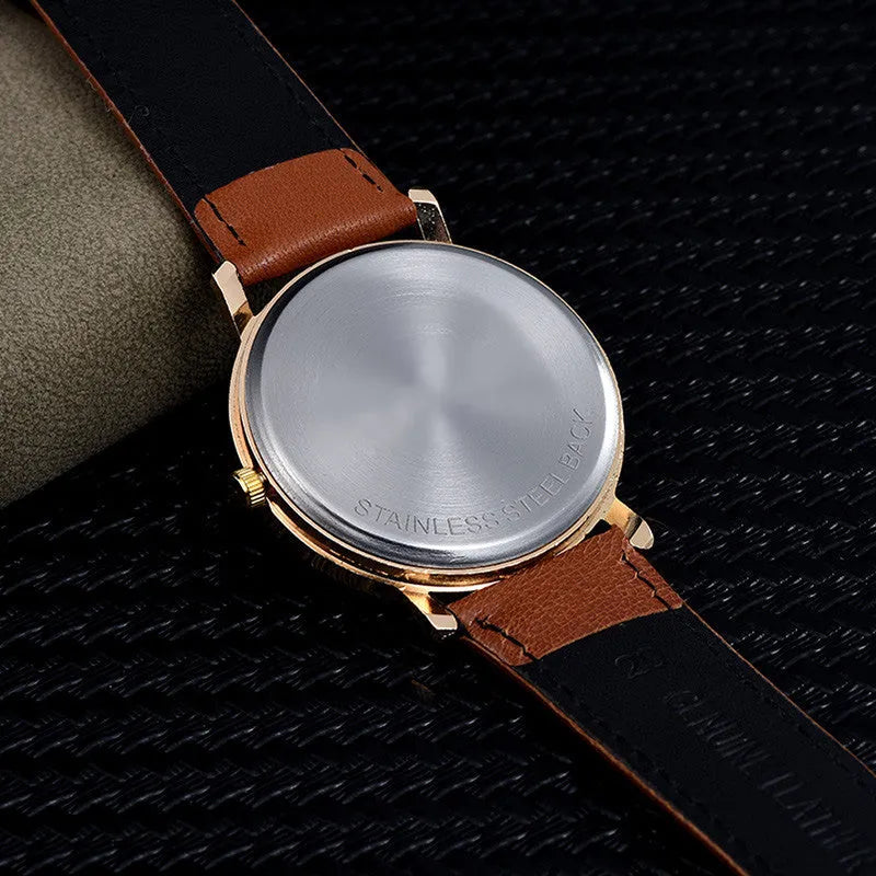 Love Tree casual quartz watch with leather strap, round 38mm dial, and pin buckle in black colour