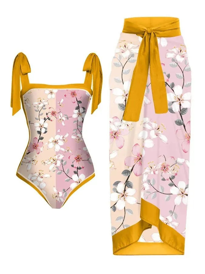 Women's floral print two-piece swimsuit with matching chiffon skirt