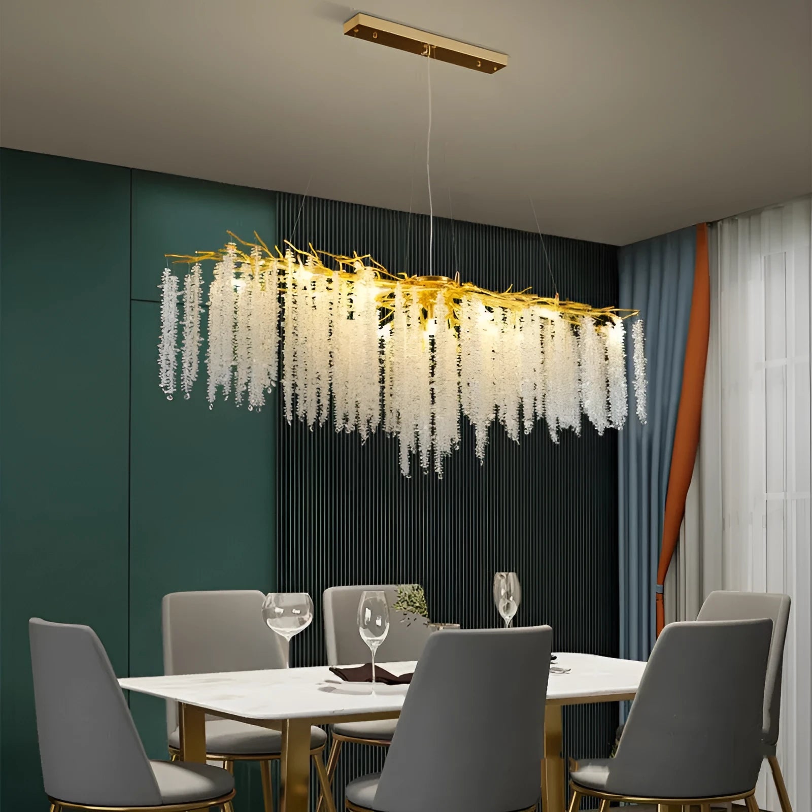 Aluminium alloy crystal chandelier light with adjustable height in round or long styles.