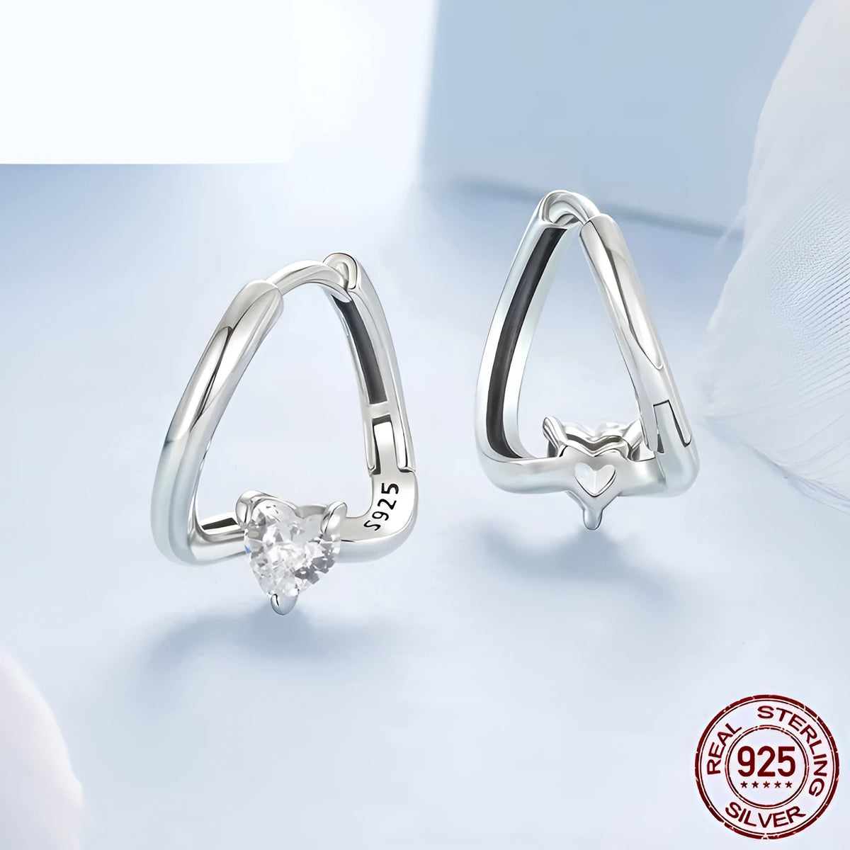 925 silver love heart ear clip with polished finish and interwoven design