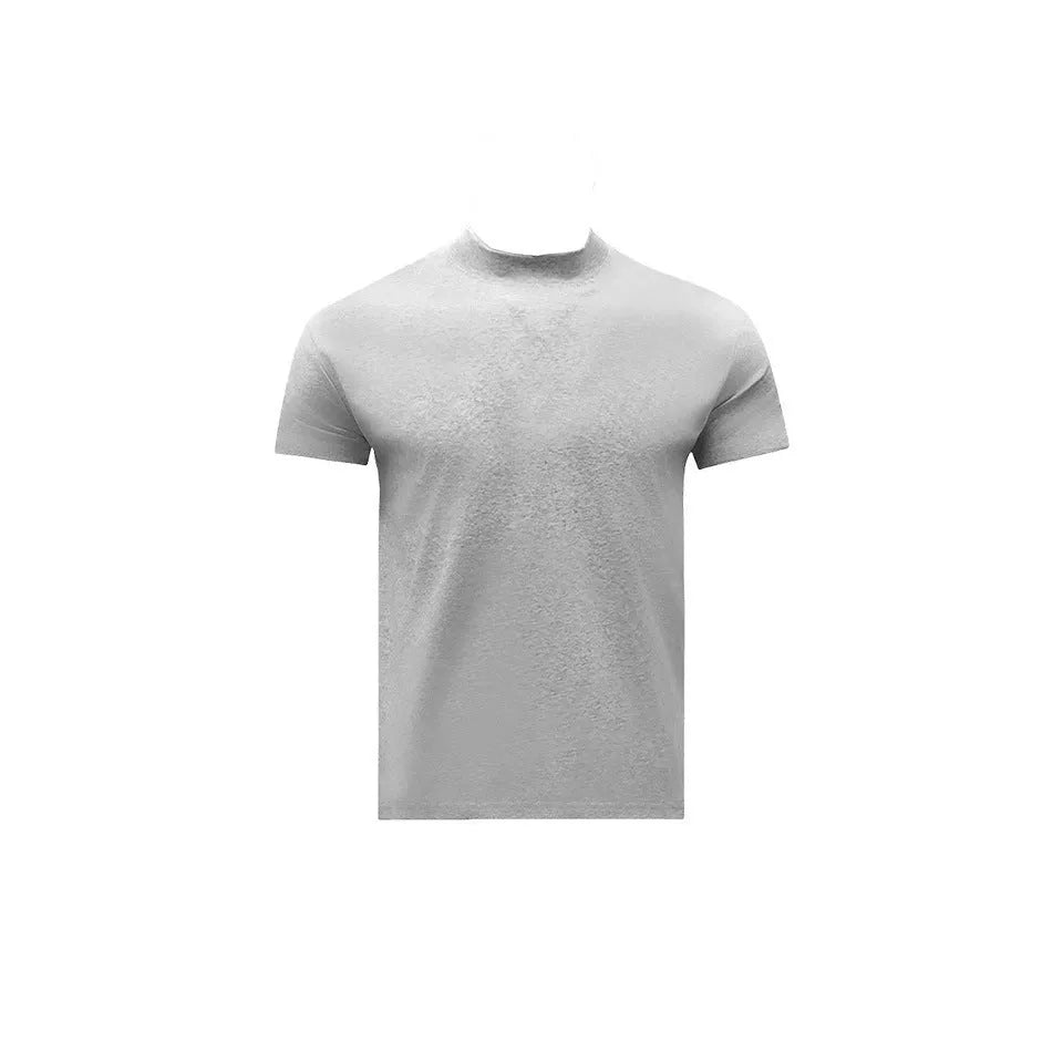 Man wearing a loose-fit grey cotton short-sleeve t-shirt with a half turtleneck cuff shoulder detail.