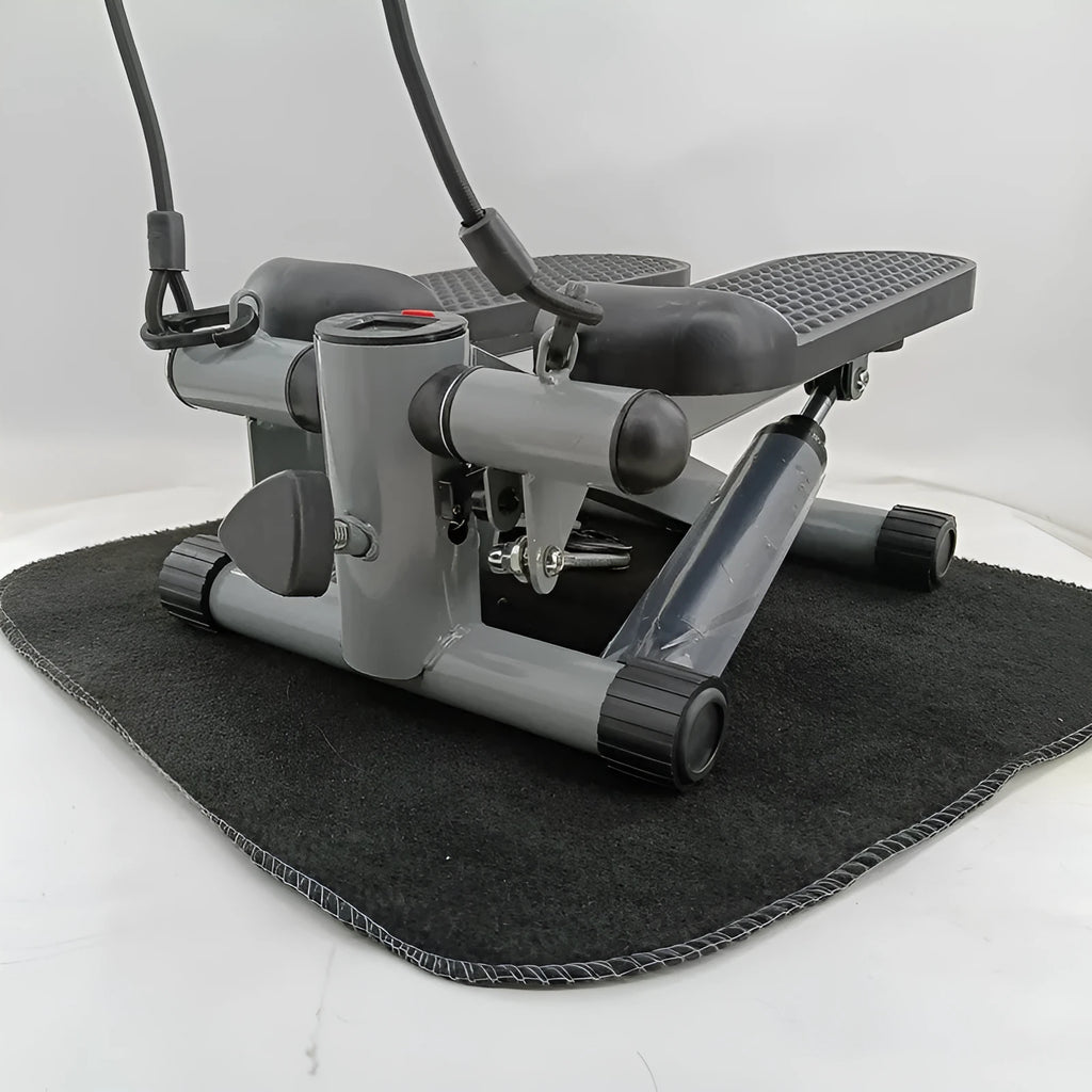 Silver grey hydraulic mini treadmill for home waist slimming fitness.