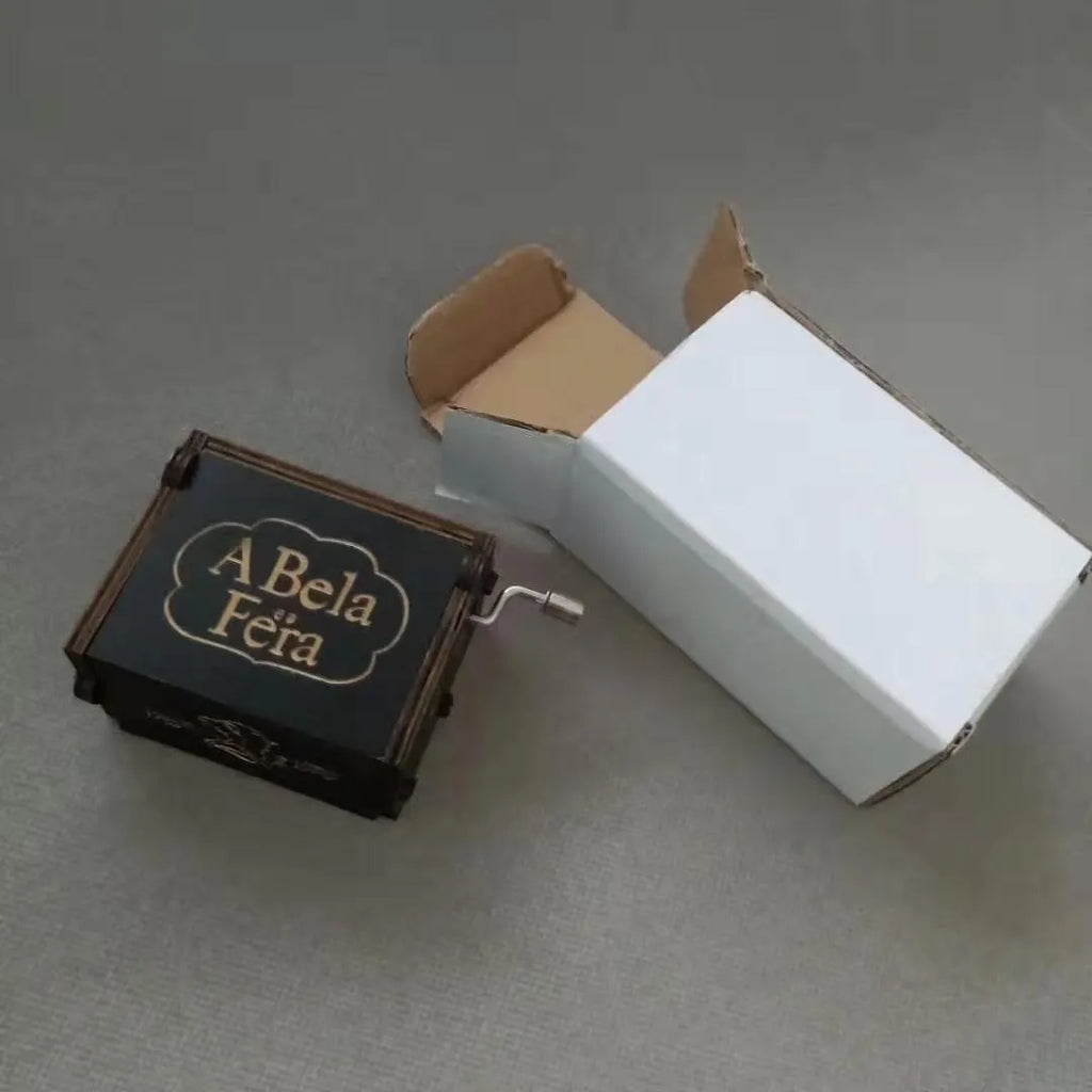 Antique carved boxwood hand crank music box with engraved landscape flower pattern for Christmas, birthday or party decoration.