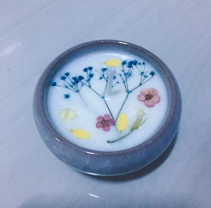 Handcrafted 10ml aromatherapy scented candle in cylindrical shape with essential oil blend