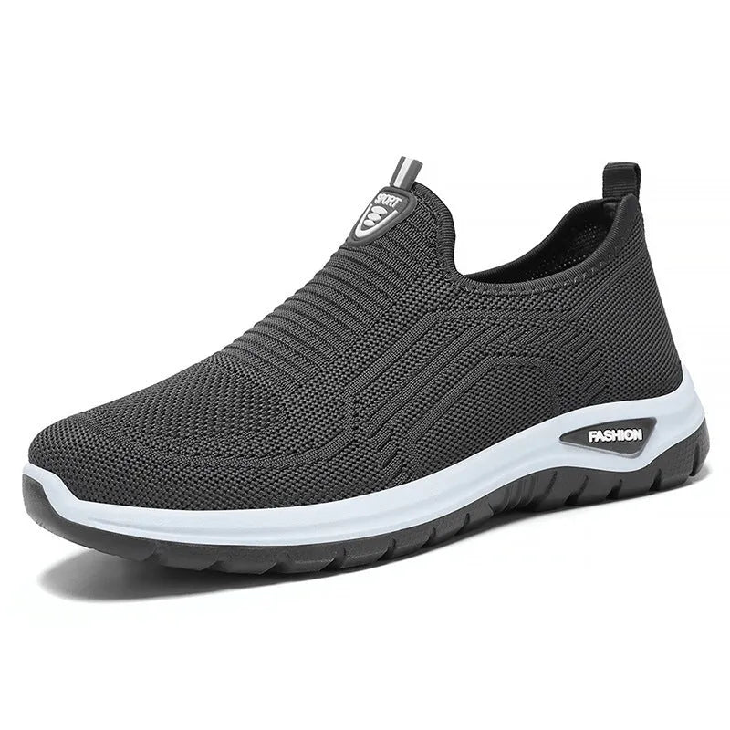 Men's black and grey breathable casual tennis shoes with mesh upper and round toe.