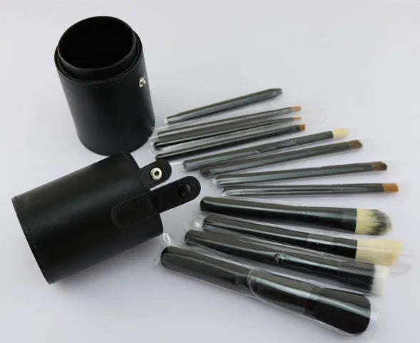 12-piece makeup brush set with wooden handles, aluminium tubes and PU storage tube, black and pink