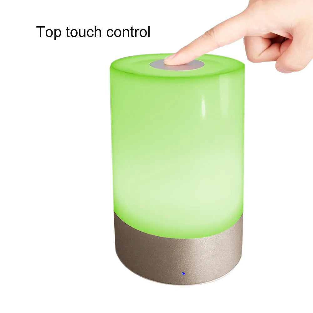 Creative home bedside night light LED lamp with dimmable white and colour light on a desk