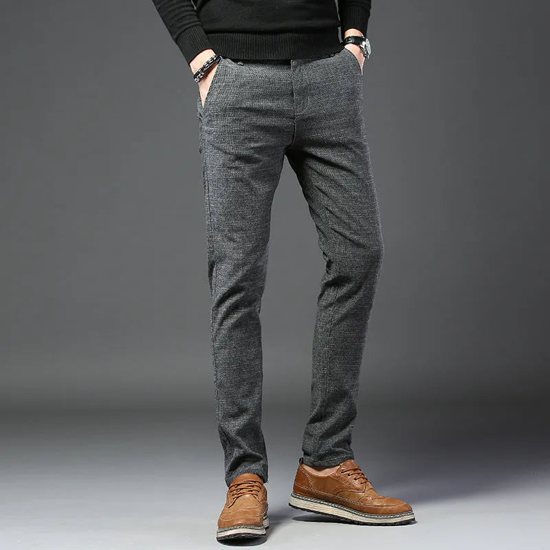 Men's casual slim fit polyester trousers in black, blue, and grey with waist sizes 28-38