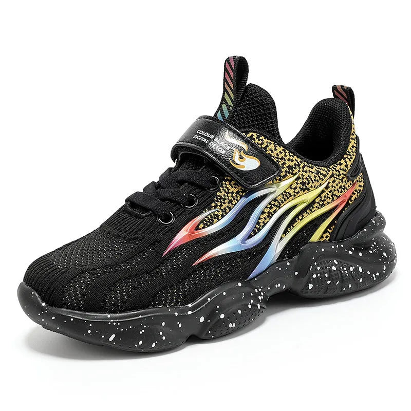 Boys beige mesh sneakers with black trim and anti-slip rubber sole on a white background.