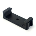 Aluminium alloy handheld bracket accessory for mounting an iPhone onto a table top tripod.