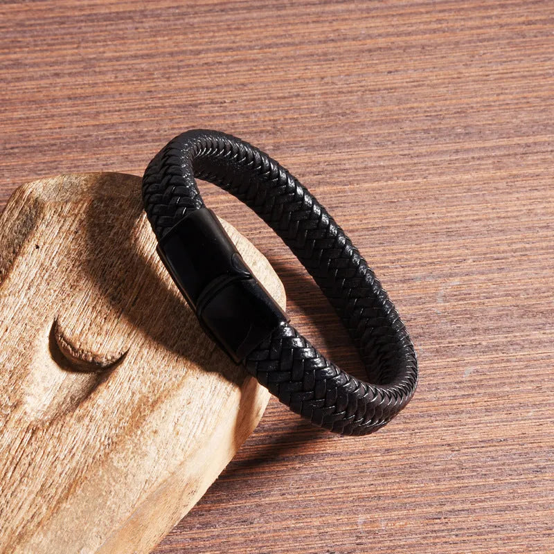 Classic men's genuine leather bracelet in black with 20.5cm length on a neutral background