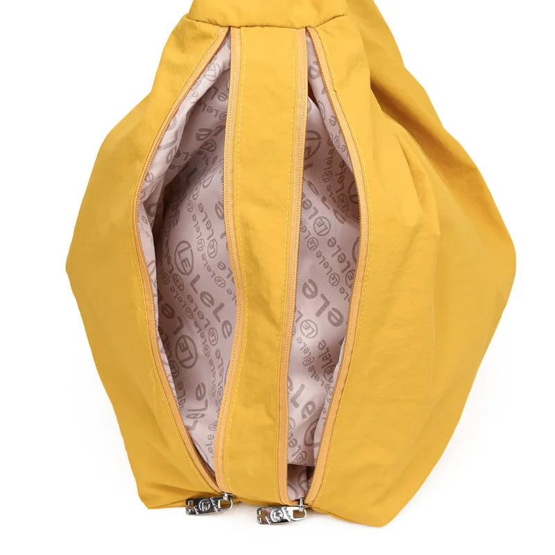 Heart-shaped nylon underarm bag for women in black, blue, khaki, or yellow colour options